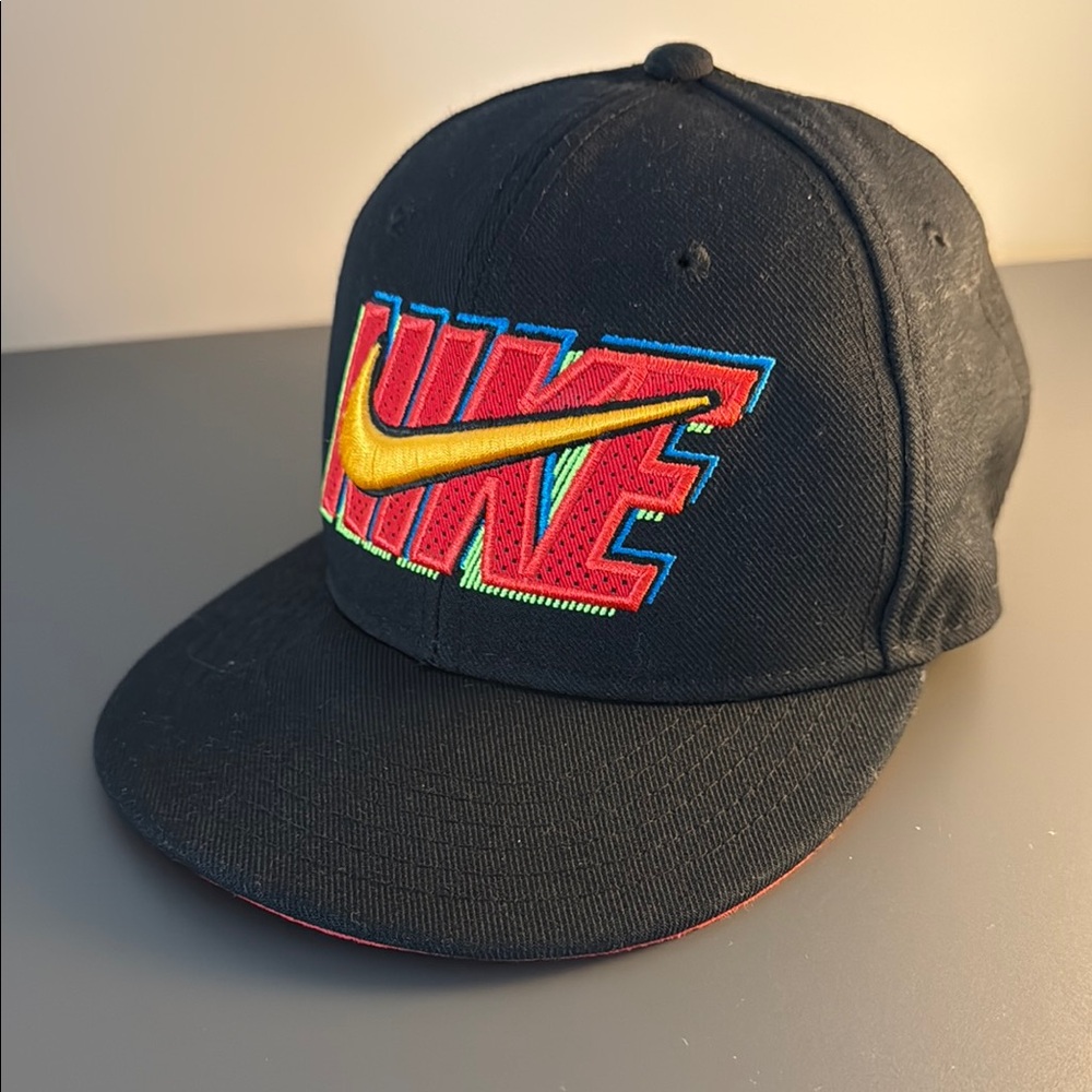 Nike Kids Black Hat with Red and Yellow Logo